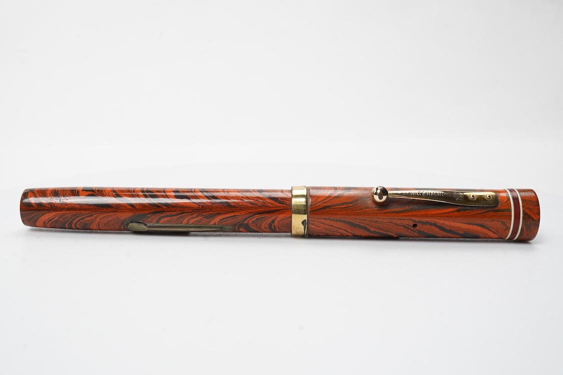 A Waterman Red Ripple No. 5 lever filler with red cap band and fitted with Waterman nib